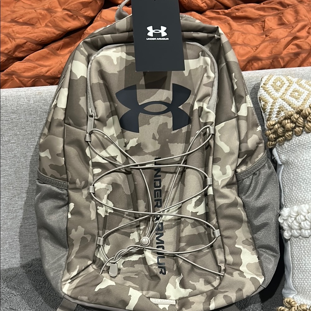Under Armour Tan and Black Backpack with Bungee Cord Design